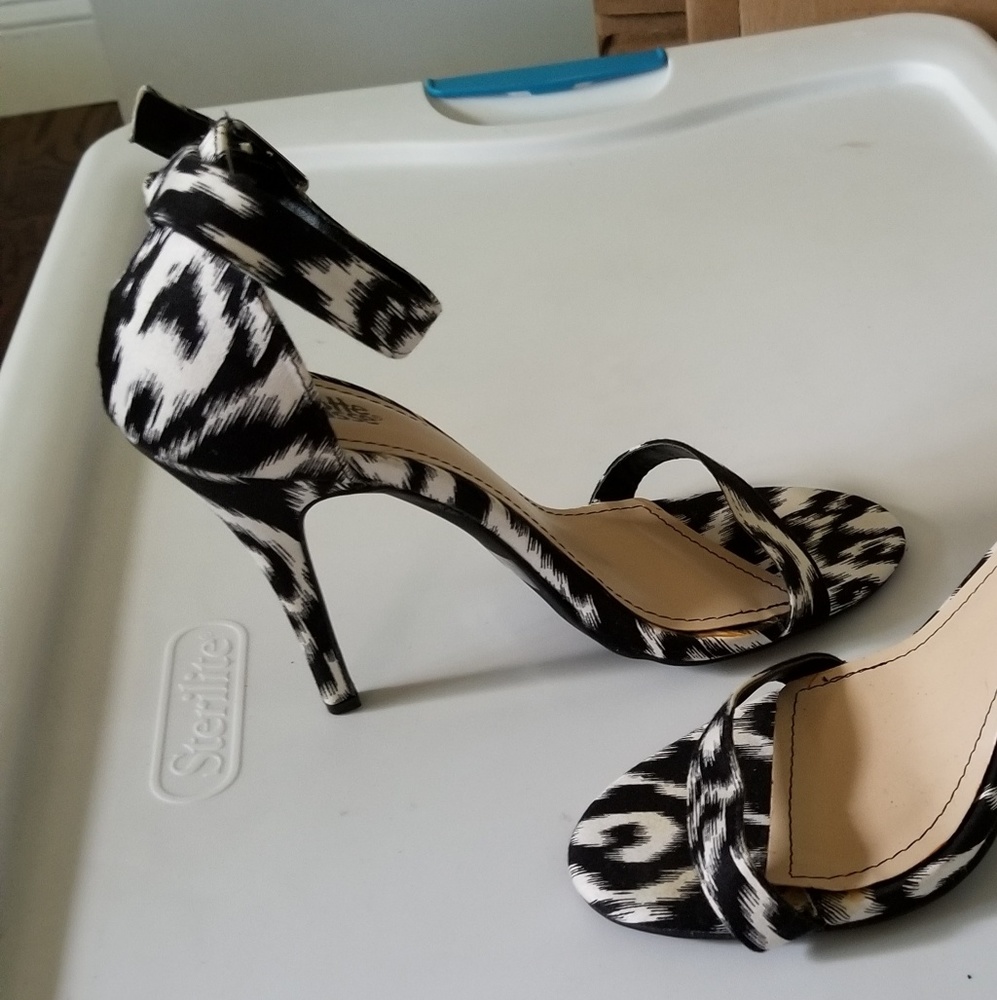 Black and white ankle strap heels
